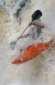 Kayak maneuvering turbulent water